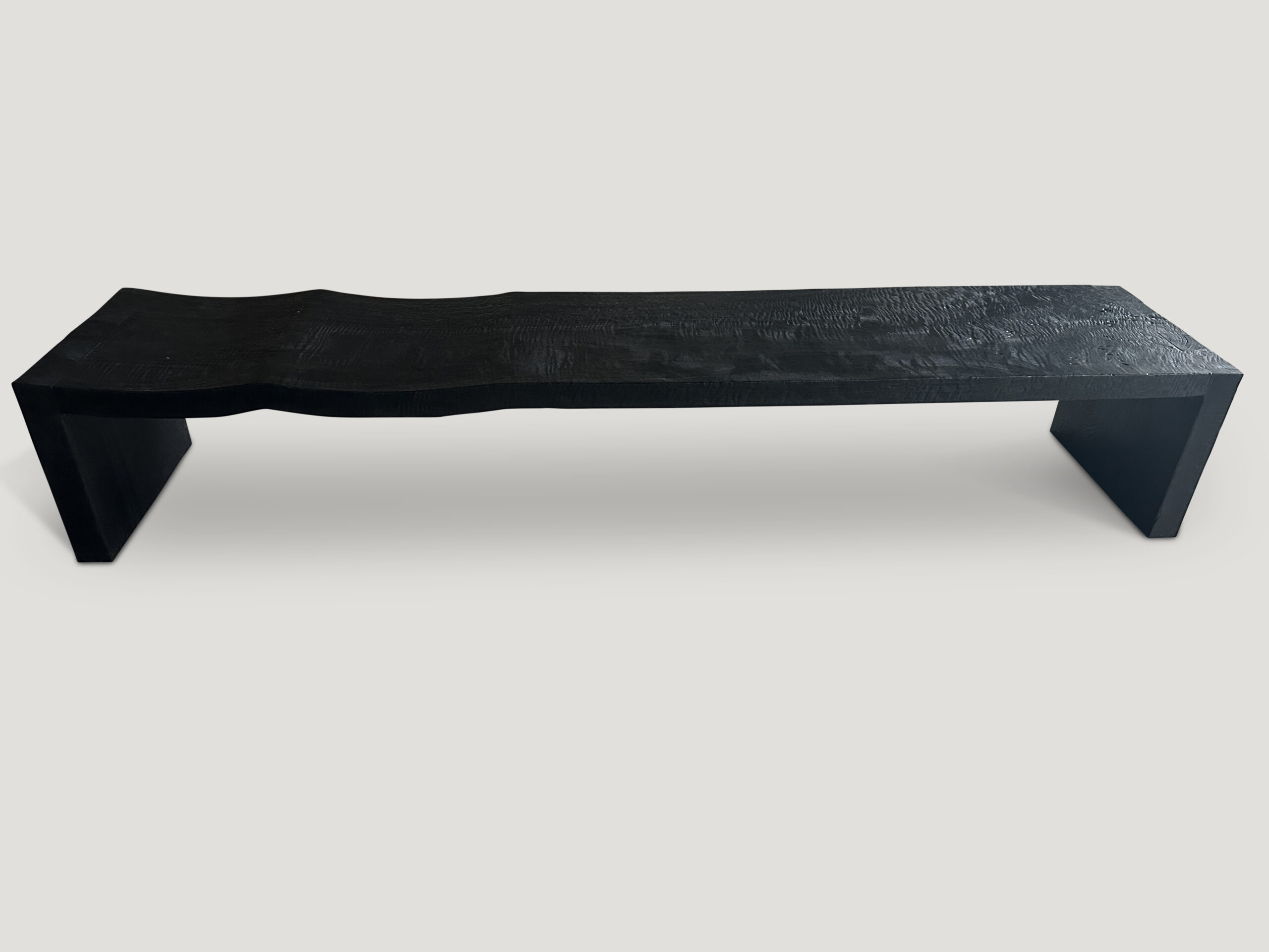 impressive minimalist charred wave bench