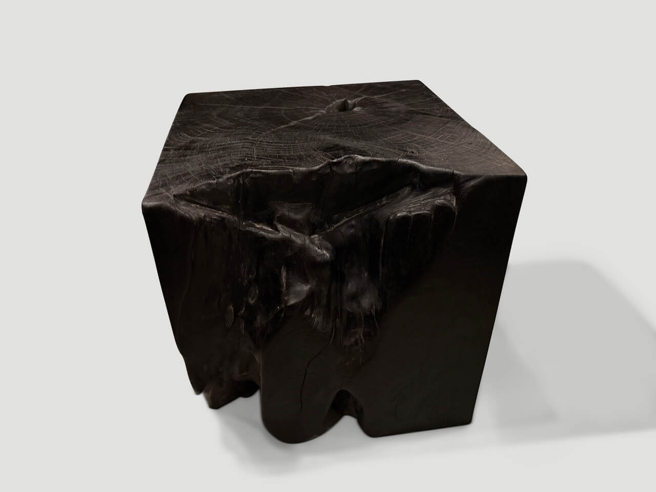 sculptural charred burnt side table