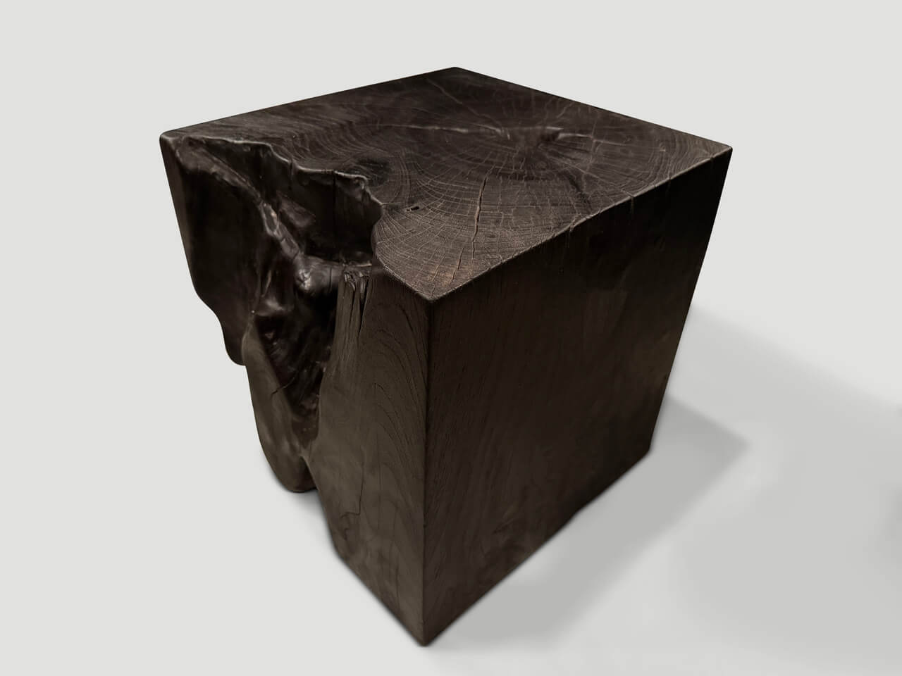 sculptural charred burnt side table