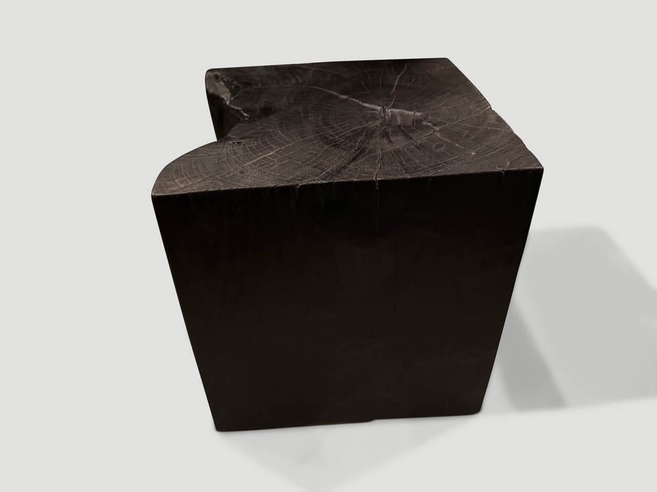 sculptural charred burnt side table