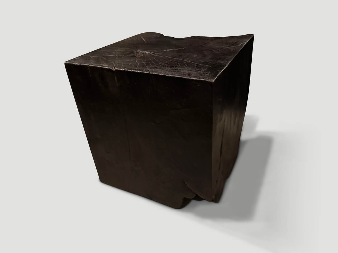 sculptural charred burnt side table