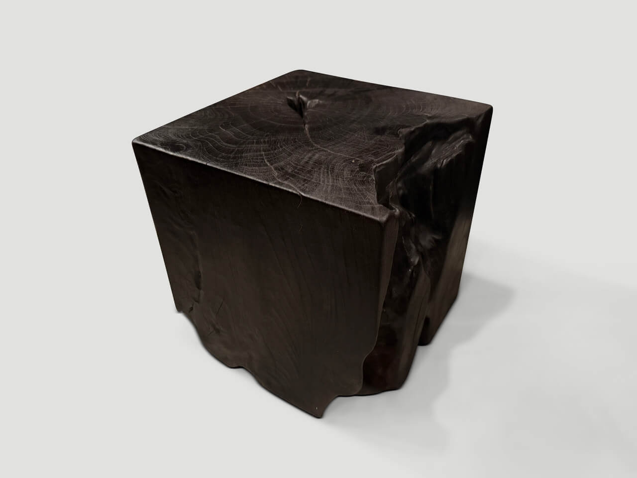 sculptural charred burnt side table