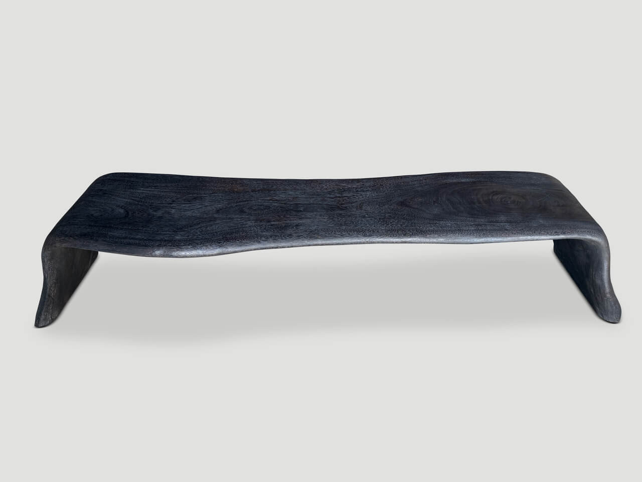 charred coffee table or bench