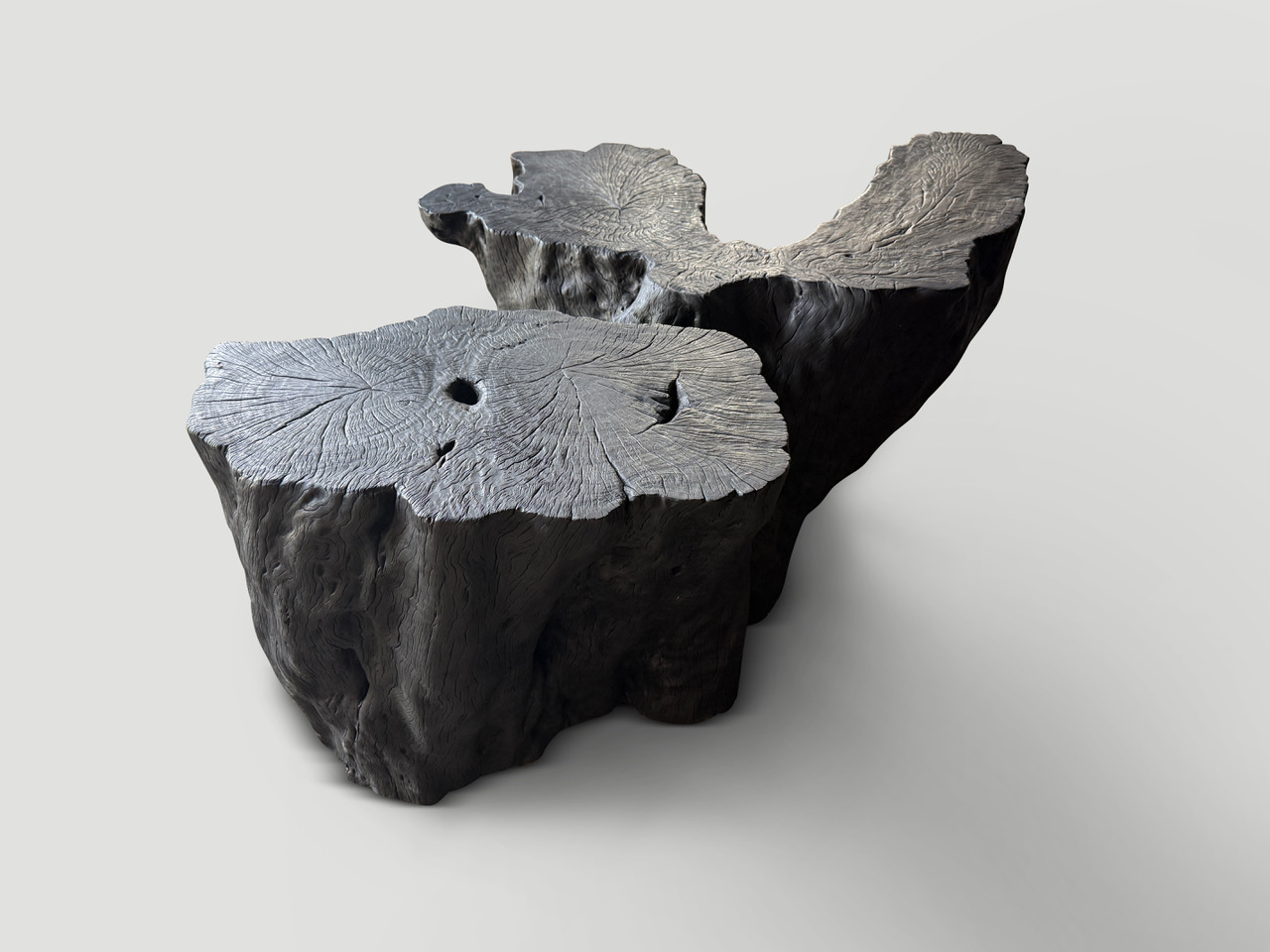 impressive charred lychee wood coffee table