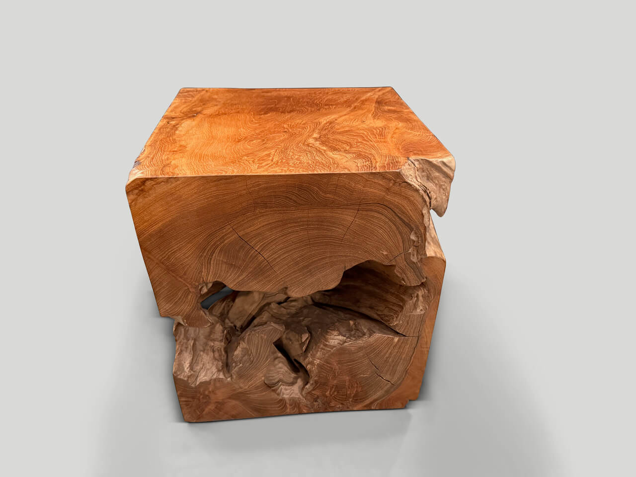 sculptural teak wood side table