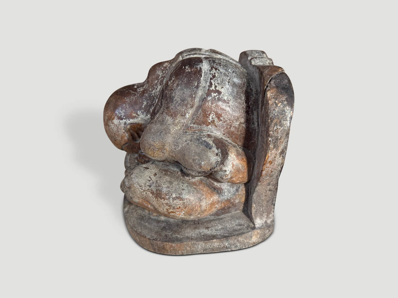 antique praying buddha