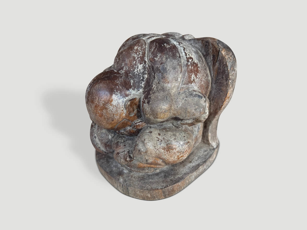 antique praying buddha