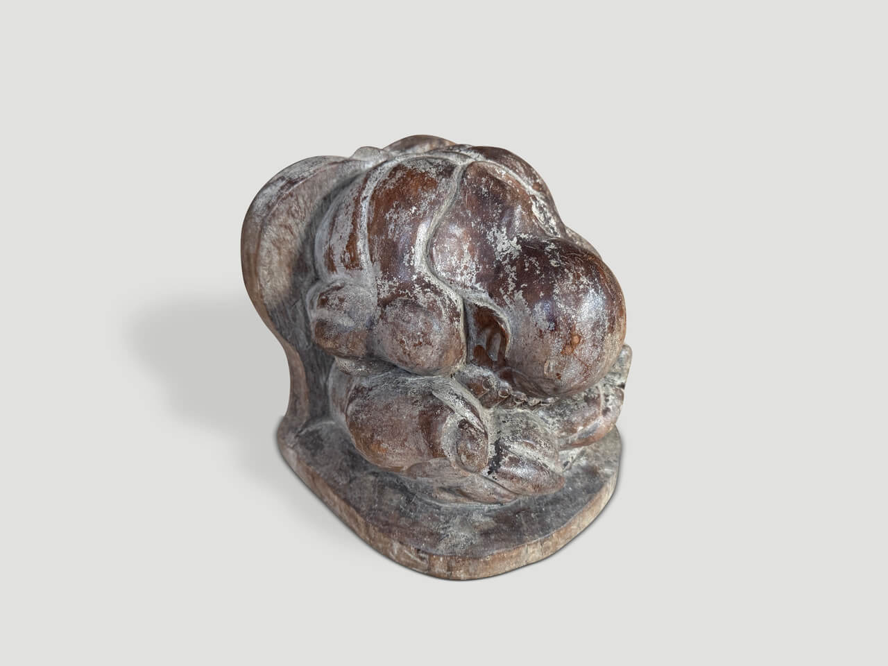 antique praying buddha