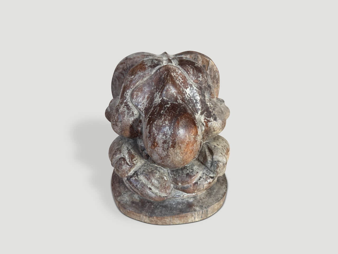 antique praying buddha