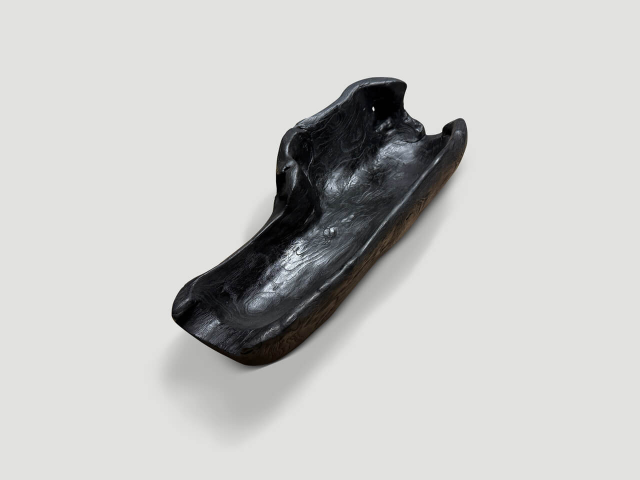 charred teak wood vessel