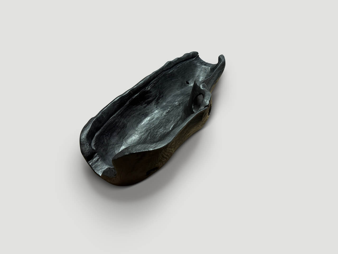 charred teak wood vessel