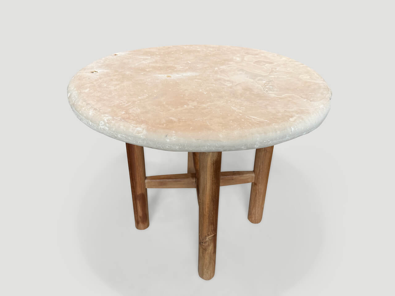 MINIMALIST ROUND STONE TABLE.
